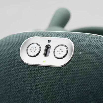 Control panel of a zevix electronic device with buttons on a gray background
